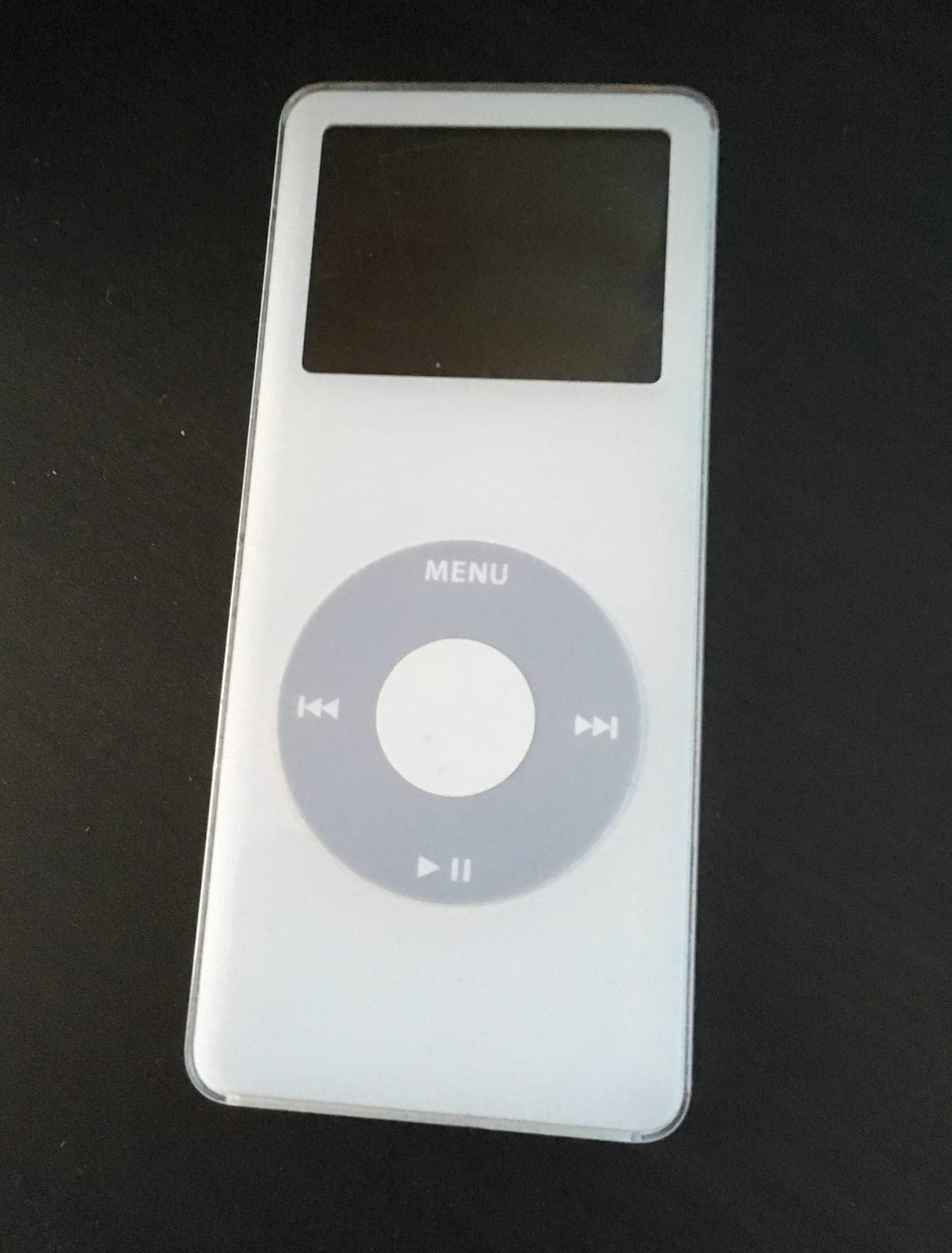 First generation iPod nano on a black background
