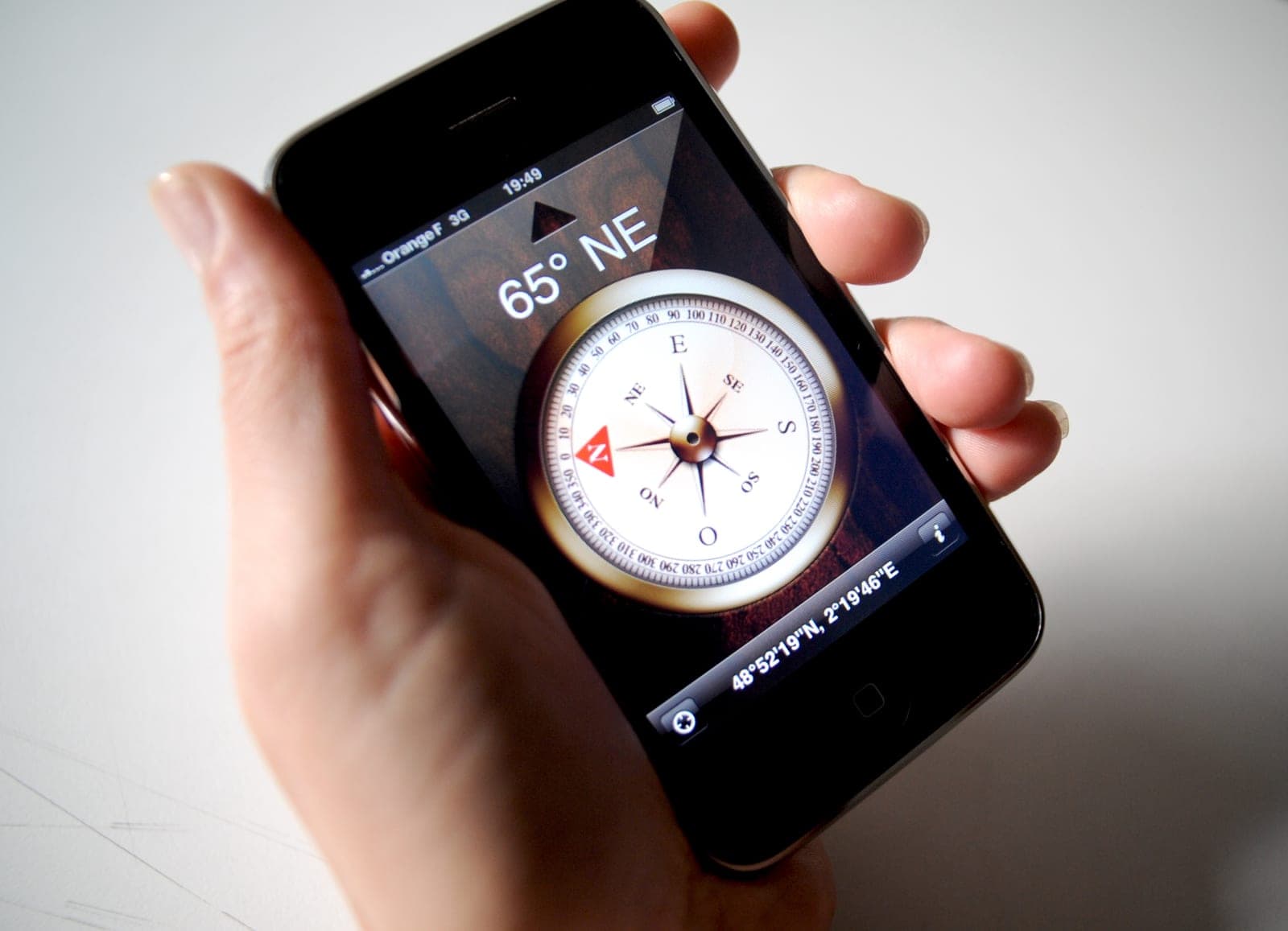 iPhone 3GS front view showing the compass app