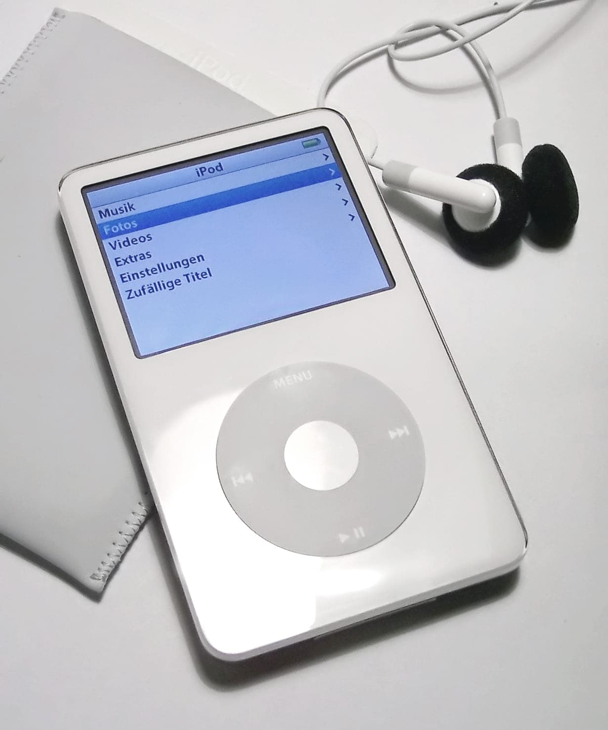 White iPod 5th generation showing the main menu
