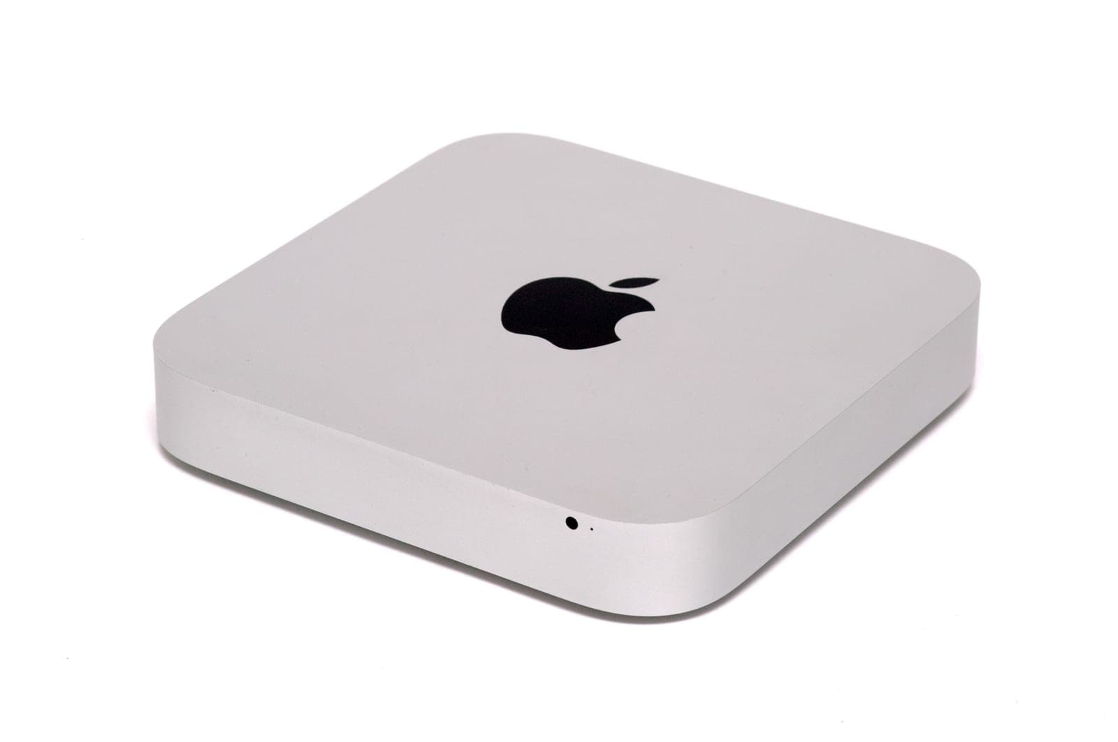 2012 Mac mini at an angle on a neutral background
