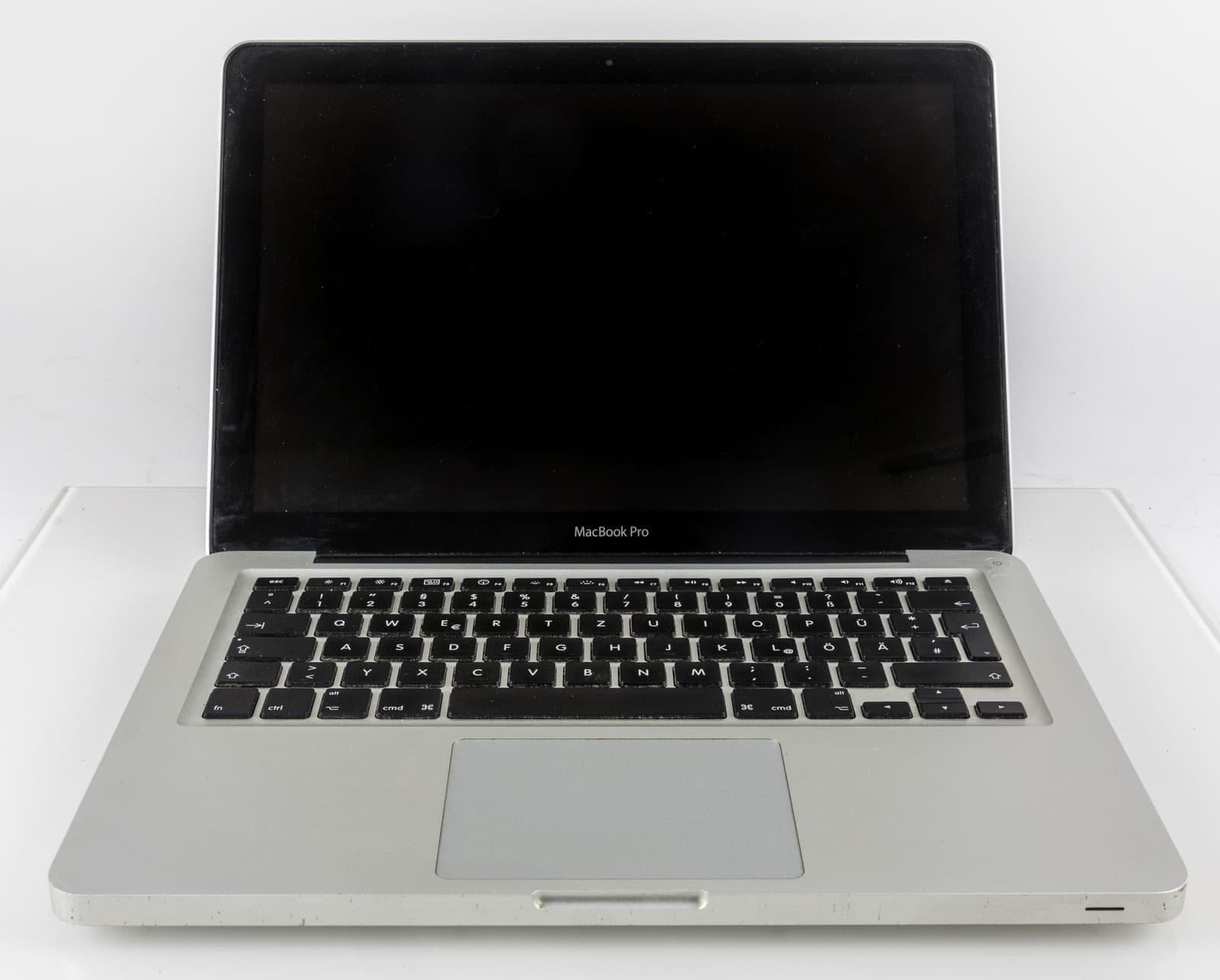 13-inch unibody MacBook Pro A1278 open on a white background